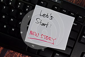 Let`s Start - New Story text on sticky notes with office desk photo