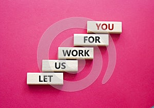 Let us work for you symbol. Wooden blocks with words Let us work for you. Beautiful red background. Business and Let us work for