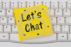 Let's Chat, computer keyboard and sticky note