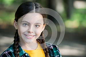 Let your smile shine all day long. Happy child smile summer outdoors. Little girl with cute smile. Oral hygiene