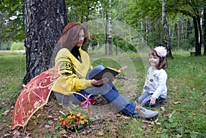 Letnic vacatireading autumn portrait smile outdoor two son baby love nature fun father smiling daughter outdoors woman children h