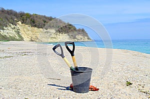 Lets clear the Earth-cleaning tools on empty beach