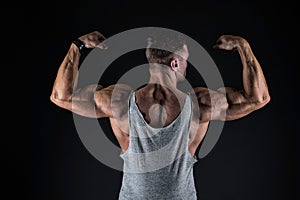 Lets get that body trained. Fit guy flex arms showing biceps triceps. Muscle power. Power and strength. Fitness and