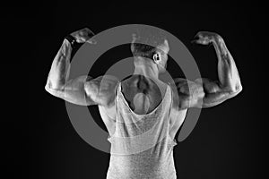 Lets get that body trained. Fit guy flex arms showing biceps triceps. Muscle power. Power and strength. Fitness and