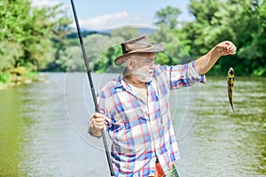 Lets go fishing. summer weekend. Big game fishing. retired bearded fisher. Trout bait. fisherman with fishing rod. hobby