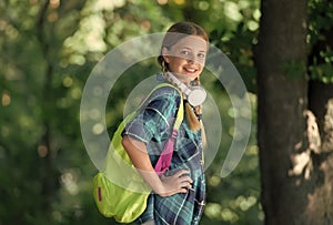 Lets go travel. Cute girl carry travel bag natural landscape. Educational trip. Tourism education. School holidays