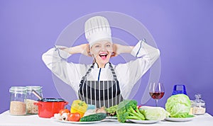 Lets start cooking. Woman chef cooking healthy food. Gourmet main dish recipes. Girl in hat and apron. Delicious recipe