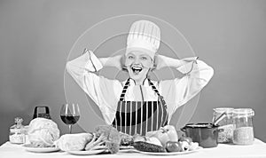 Lets start cooking. Woman chef cooking healthy food. Gourmet main dish recipes. Girl in hat and apron. Delicious recipe