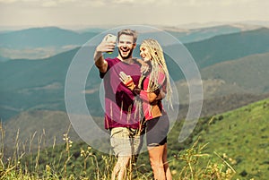 Lets take photo. Capturing beauty. Man and woman posing mobile photo. Couple taking photo. Summer vacation concept