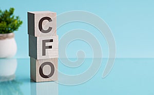 Letter of the alphabet of CFO on a light blu background
