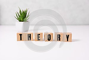 Letter block in word theory on white background.