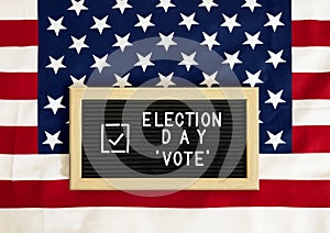 Letter Board of Happy Election Day and USA Vote with American Flag Background
