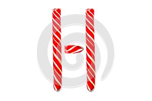 Letter C made of Red Candy Cane. Festive font C isolated on white