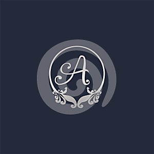 Letter A Decorative Crown Ring Alphabet Logo isolated on Navy Blue Background. Luxury Silver Initial Abjad Logo Design Template.