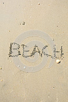 Letter drawn on the sand beach