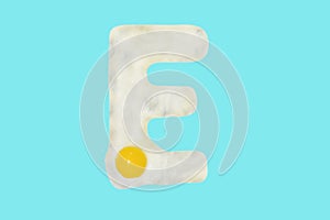 The letter E from a fried egg