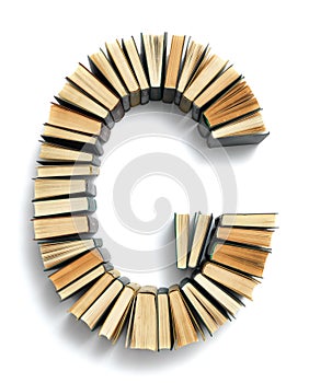 Letter G formed from the page ends of books