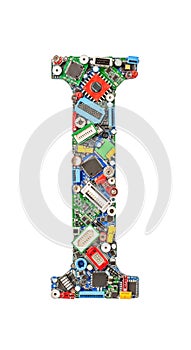Letter i constructed from electronic components on white background