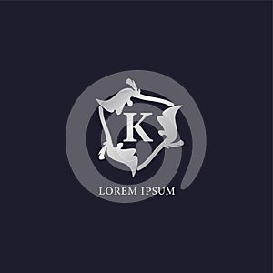 Letter K Alphabet logo design template. Initial Abjad Company Logo. Silver Metallic Luxury Decorative Floral Vector Design Concept