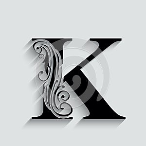 Letter K.   Black flower alphabet.  Beautiful capital letters with shadow