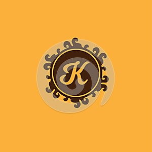 Letter K Decorative Alphabet Logo isolated on Orange Background, Elegant Curl & Floral Logo Concept, Brown Luxury Initial Abjad