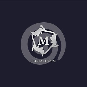 Letter M Alphabet logo design template. Initial Abjad Company Logo. Silver Metallic Luxury Decorative Floral Vector Design Concept