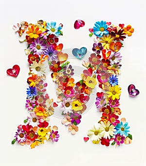 The letter m made of flowers and hearts photo