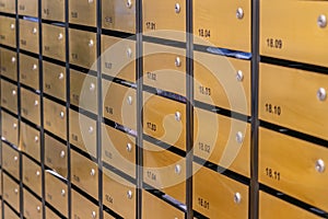 Letter mailbox rows in postal room of condominium building