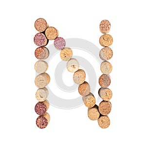 The letter `N` is made of wine corks. Isolated on white background