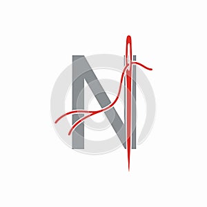 Letter N with Needle and Thread Logo Design