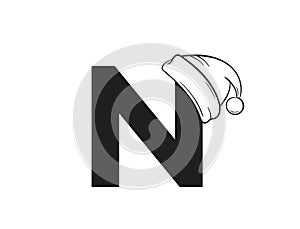 Letter n with santa claus hat. initial letter for Christmas and New Year text design. isolated vector image