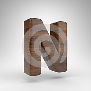 Letter N uppercase on white background. Dark oak 3D letter with brown wood texture.