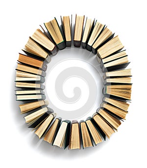 Letter O formed from the page ends of books