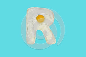 The letter R from a fried egg