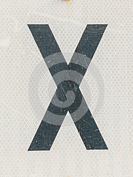 Letter X railroad crossing sign background texture