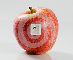 Letter A on a red apple