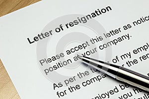 Letter of resignation silver pen photo