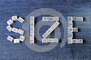 Letter SIZE from various plastic clothing size tags