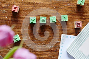 Letter stamps forming the word yeah