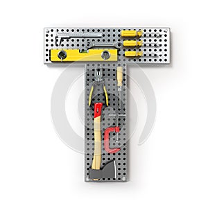 Letter T. Alphabet from the tools on the metal pegboard isolated photo
