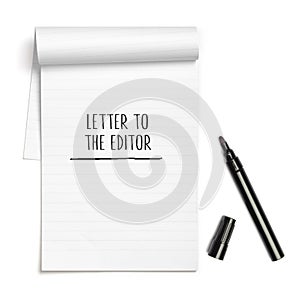 Letter to the editor headline on paper note book photo