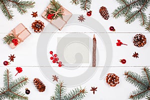 Letter to Santa on holiday background with Christmas gifts, Fir branches, pine cones, red decorations. Xmas and Happy New Year