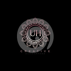 Letter UH Elegant initial logo Lotus vector