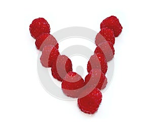 letter V made from raspberries. isolated on white background for birthday party