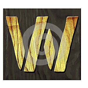 Letter W. Alphabet made of letters, made of wood, on a dark wooden plank. Isolated on white background. Education