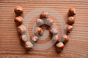 The letter W made with hazelnuts
