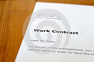 A letter on a wooden table photo