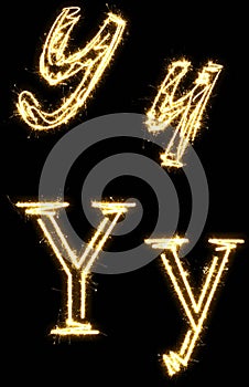 Letter Y. Alphabet made by sparkler. Isolated on a black background.