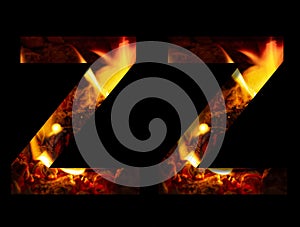 The letter Z made from fire and burning wood on a black background, a double version of the alphabet for decorative signatures