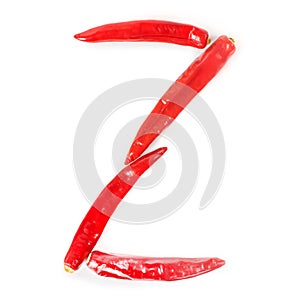 Letter Z made from red hot chili peppers. Isolated on white background